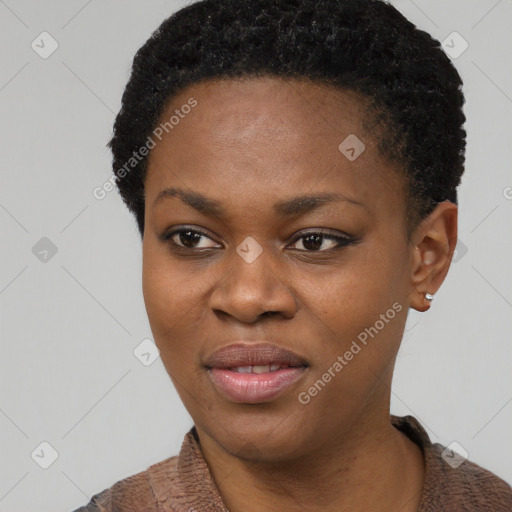 Joyful black young-adult female with short  black hair and brown eyes