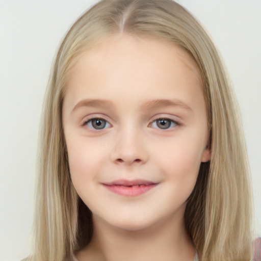 Joyful white child female with long  brown hair and grey eyes