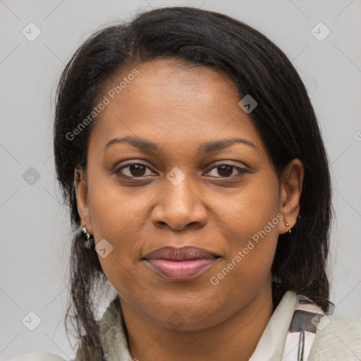 Joyful black young-adult female with medium  brown hair and brown eyes