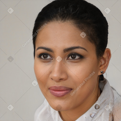 Joyful latino young-adult female with short  brown hair and brown eyes