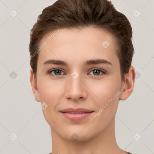 Joyful white young-adult female with short  brown hair and brown eyes