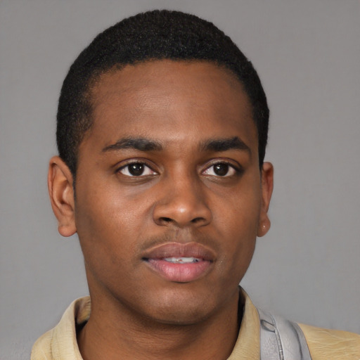 Neutral latino young-adult male with short  brown hair and brown eyes