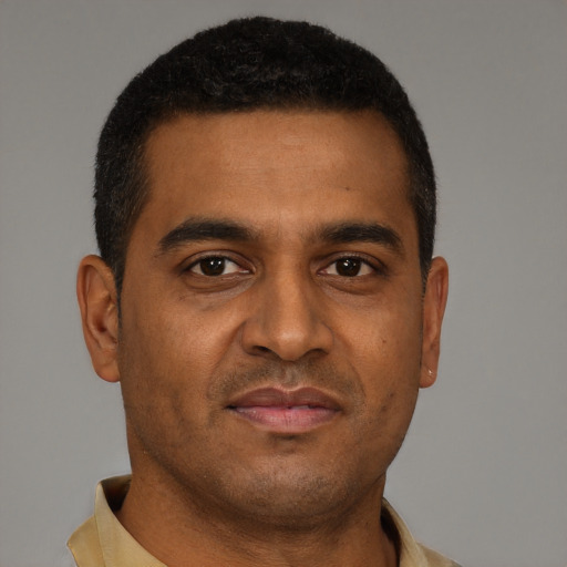 Neutral black young-adult male with short  brown hair and brown eyes