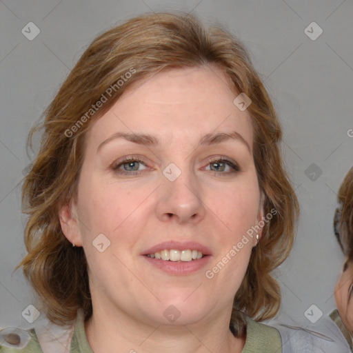 Joyful white young-adult female with medium  brown hair and blue eyes