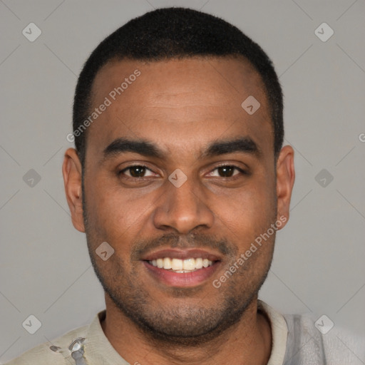 Joyful black young-adult male with short  black hair and brown eyes