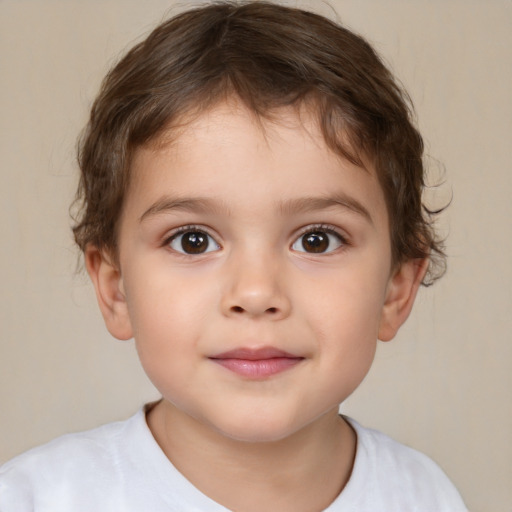 Joyful white child male with short  brown hair and brown eyes