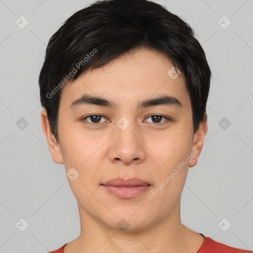 Joyful white young-adult male with short  black hair and brown eyes