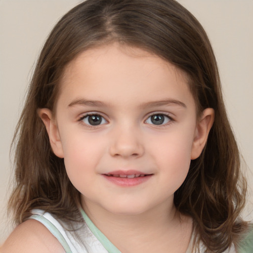 Joyful white child female with medium  brown hair and brown eyes