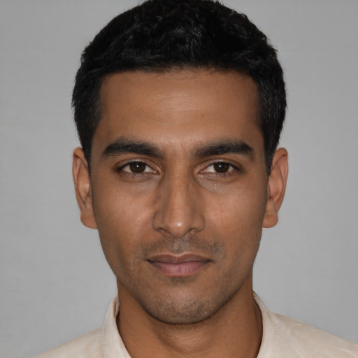 Neutral latino young-adult male with short  black hair and brown eyes