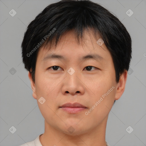 Neutral asian young-adult male with short  brown hair and brown eyes