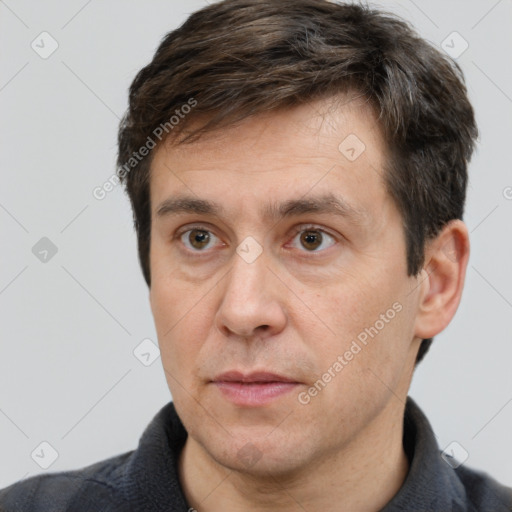 Neutral white adult male with short  brown hair and brown eyes