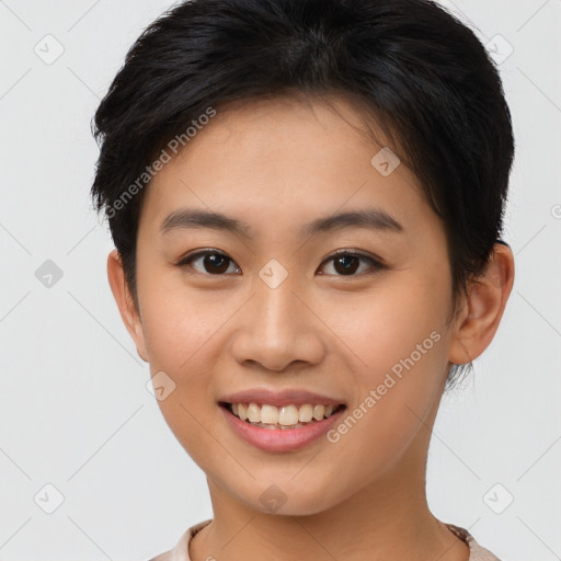 Joyful asian young-adult female with short  brown hair and brown eyes