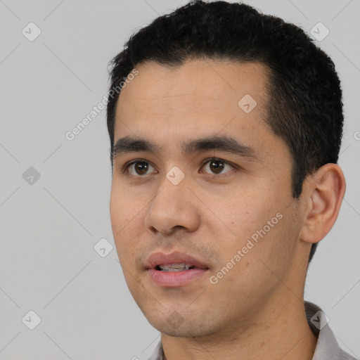 Neutral latino young-adult male with short  black hair and brown eyes