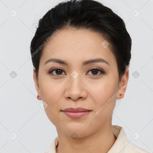 Joyful asian young-adult female with short  black hair and brown eyes