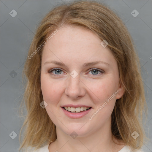 Joyful white young-adult female with medium  brown hair and blue eyes