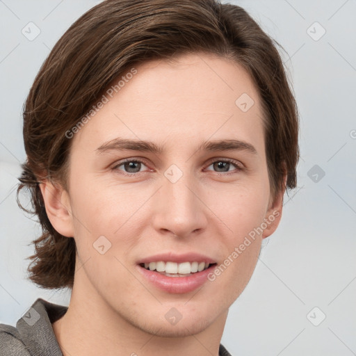 Joyful white young-adult female with short  brown hair and grey eyes