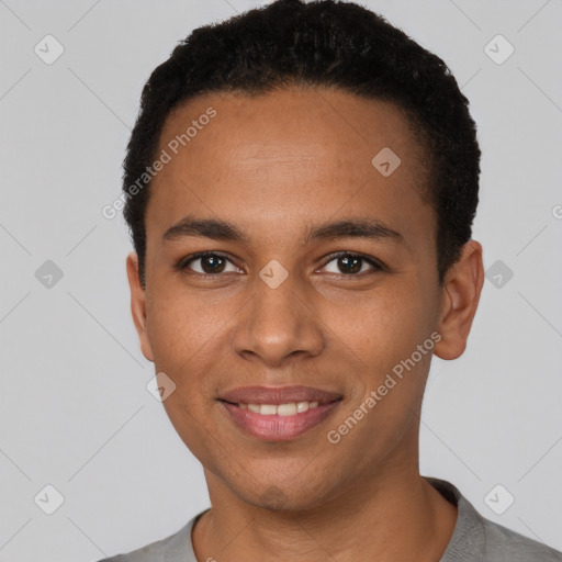 Joyful black young-adult male with short  brown hair and brown eyes