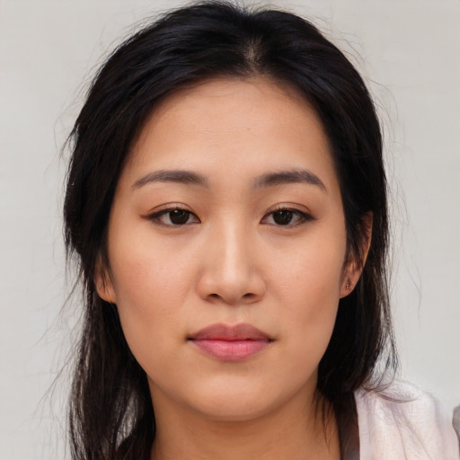 Neutral asian young-adult female with medium  brown hair and brown eyes