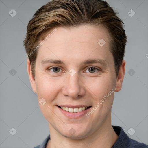 Joyful white adult female with short  brown hair and grey eyes