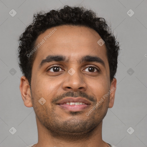 Joyful latino young-adult male with short  brown hair and brown eyes