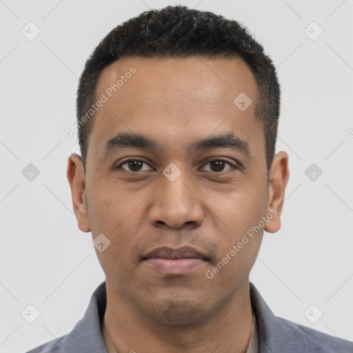 Neutral latino young-adult male with short  black hair and brown eyes