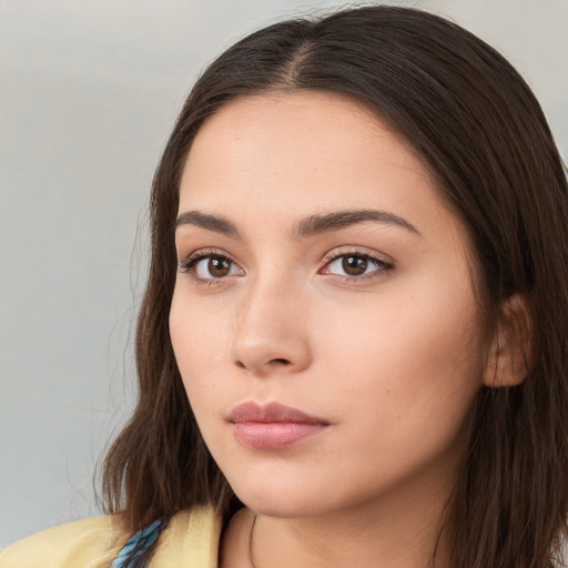 Neutral white young-adult female with long  brown hair and brown eyes