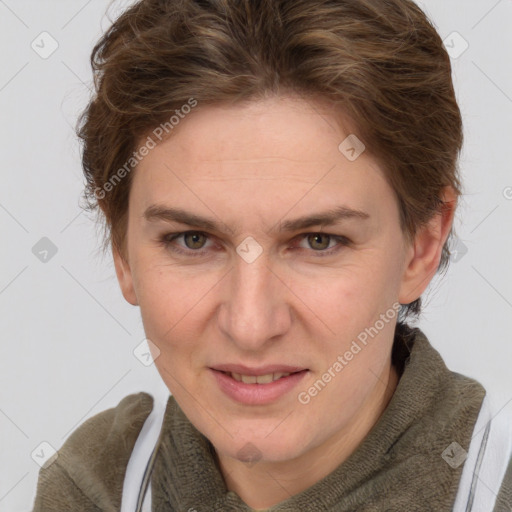 Joyful white adult female with short  brown hair and grey eyes