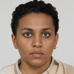 Neutral black young-adult female with short  brown hair and brown eyes