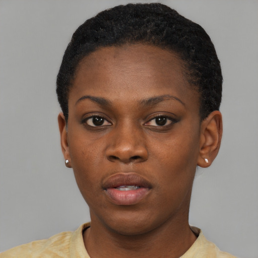 Neutral black young-adult female with short  black hair and brown eyes