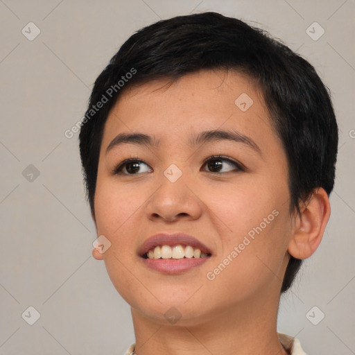 Joyful asian young-adult female with short  black hair and brown eyes