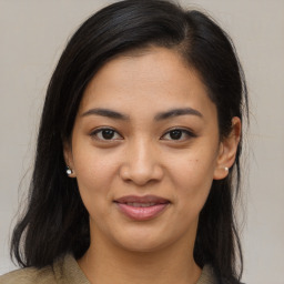 Joyful asian young-adult female with medium  brown hair and brown eyes