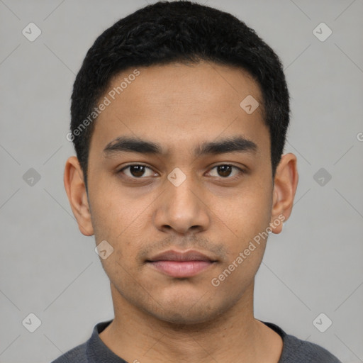 Neutral latino young-adult male with short  black hair and brown eyes