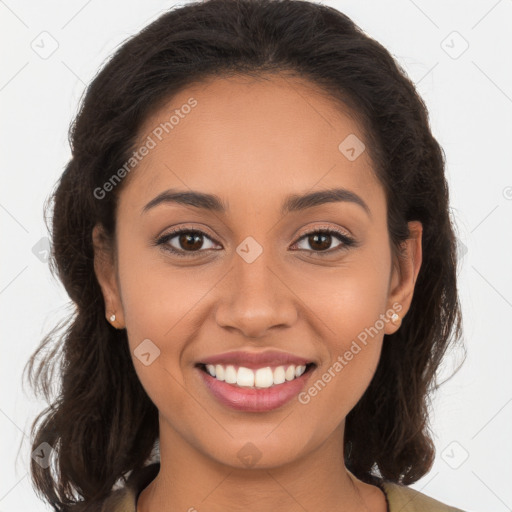 Joyful white young-adult female with long  brown hair and brown eyes