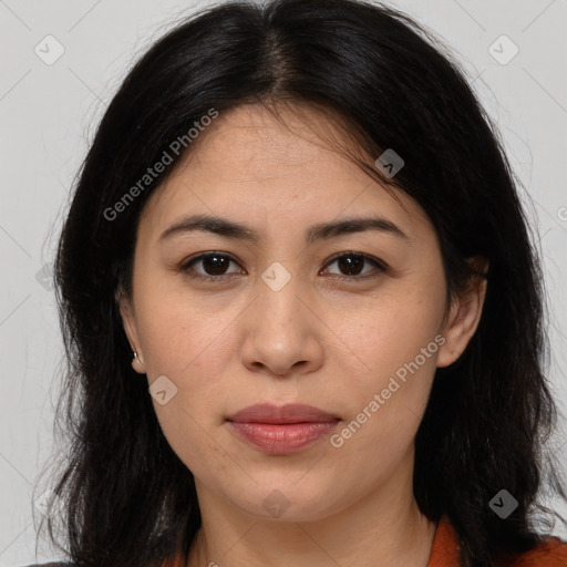 Joyful latino young-adult female with medium  brown hair and brown eyes