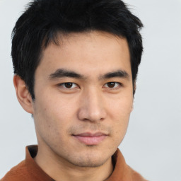 Neutral asian young-adult male with short  brown hair and brown eyes