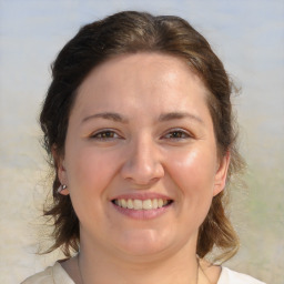 Joyful white adult female with medium  brown hair and brown eyes