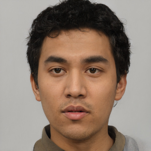 Neutral asian young-adult male with short  black hair and brown eyes