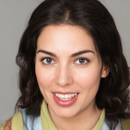 Joyful white young-adult female with medium  brown hair and brown eyes