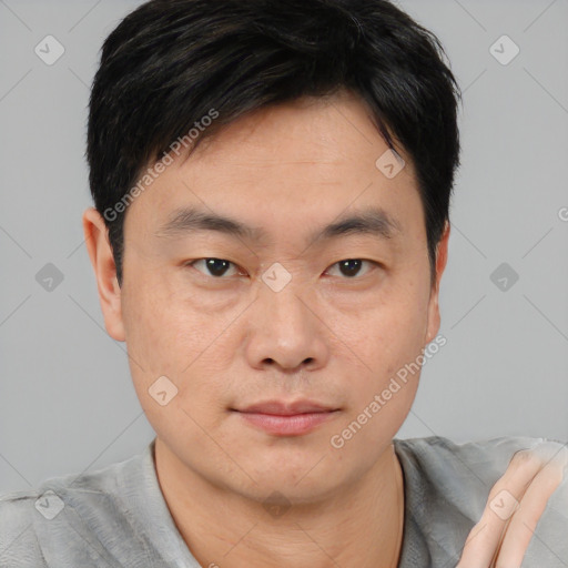 Neutral asian young-adult male with short  black hair and brown eyes