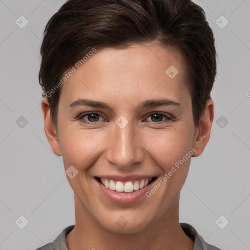 Joyful white young-adult female with short  brown hair and brown eyes