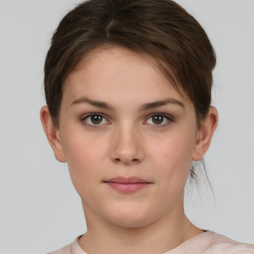 Neutral white young-adult female with short  brown hair and brown eyes