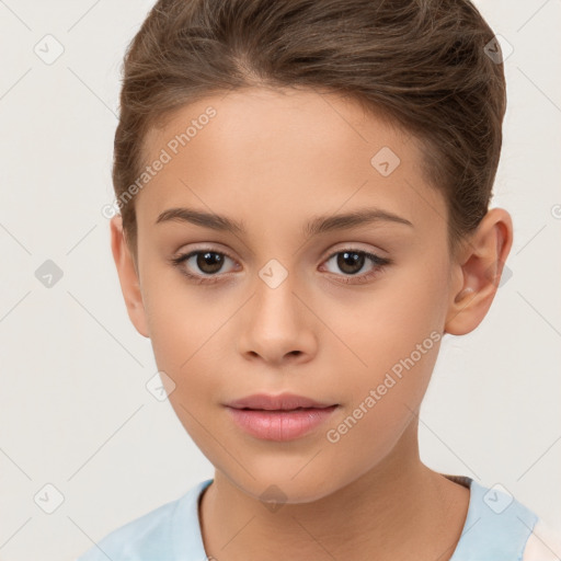 Joyful white child female with short  brown hair and brown eyes