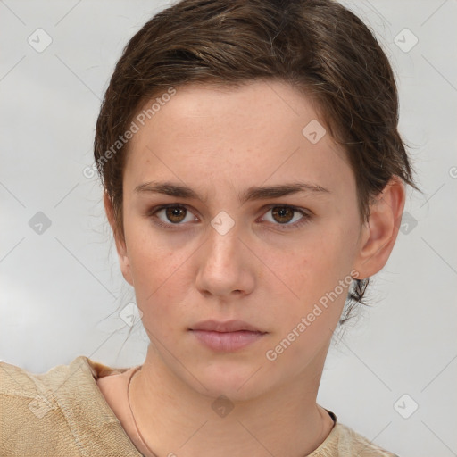 Neutral white young-adult female with short  brown hair and brown eyes