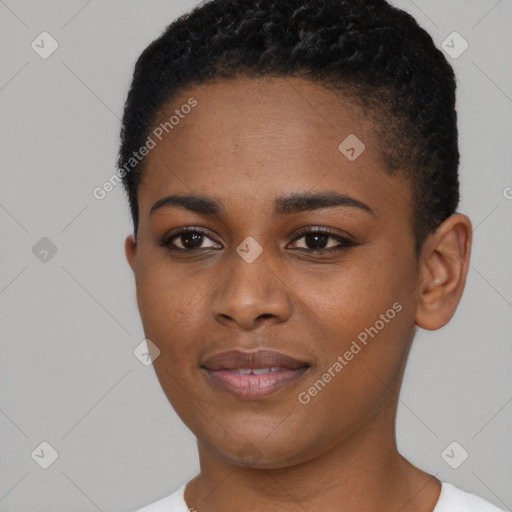 Joyful black young-adult female with short  brown hair and brown eyes