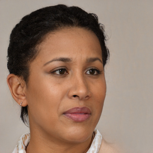Neutral black young-adult female with short  brown hair and brown eyes