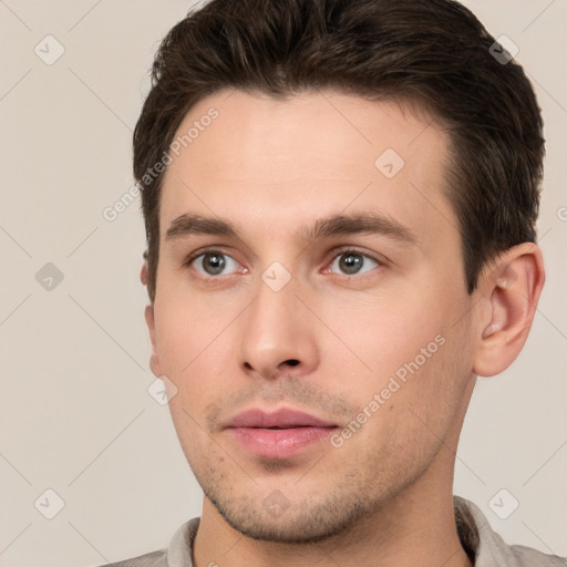 Neutral white young-adult male with short  brown hair and brown eyes