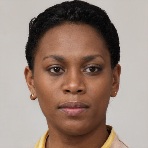 Neutral black young-adult female with short  brown hair and brown eyes