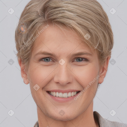 Joyful white young-adult female with short  brown hair and grey eyes