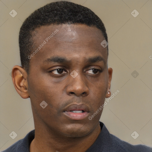 Neutral black young-adult male with short  brown hair and brown eyes