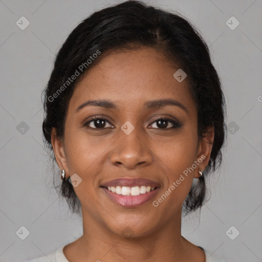 Joyful black young-adult female with medium  black hair and brown eyes